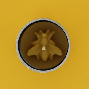 Cornish beeswax bee candle in a tin