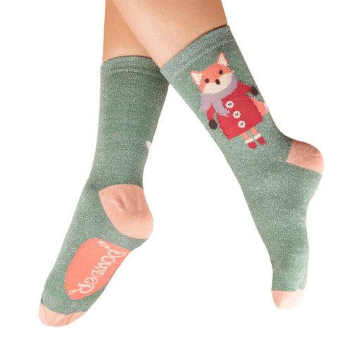 Green socks with a fox design on a white background
