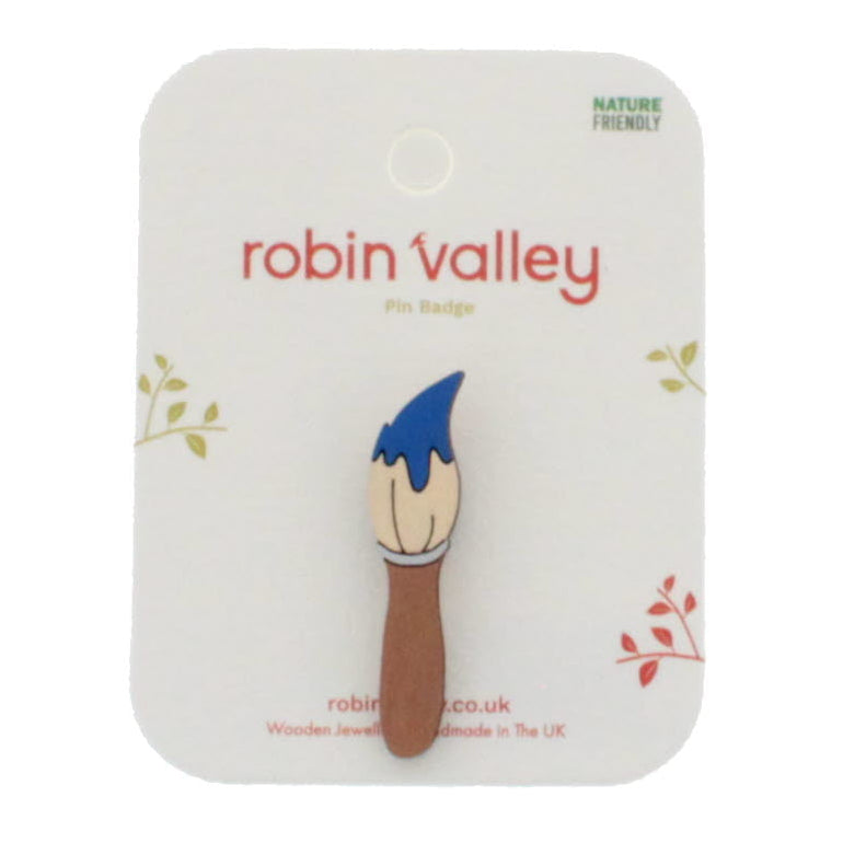 Paint brush pin badge in blue