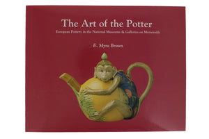 Front cover of The Art of the Potter showing a teapot in the shape of a monkey.
