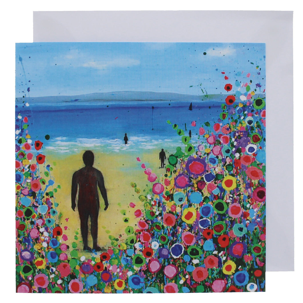 Greeting card with a painting of the statues on Crosby beach in the sunshine with a floral design.