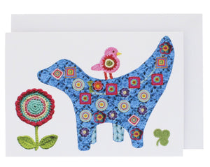 Greeting card featuring a knitted version of the Super Lambanana, a statue that is half Lamb and half Banana.