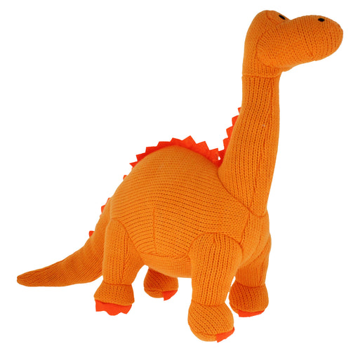 Knitted Diplodocus dinosaur in orange.