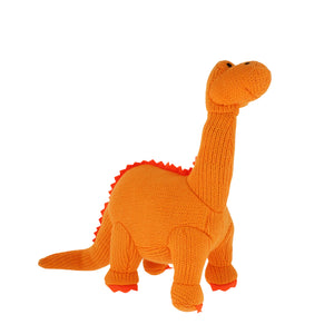 Knitted Diplodocus dinosaur in orange.