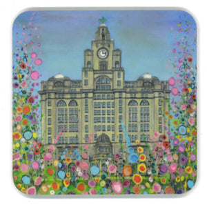Coaster with a painting of Liverpool's Liver Building surrounded by abstract flowers.