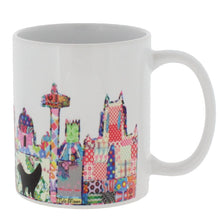 Load image into Gallery viewer, Ceramic mug featuring Liverpool&#39;s skyline in Tula Moon&#39;s distinctive bright patchwork style.