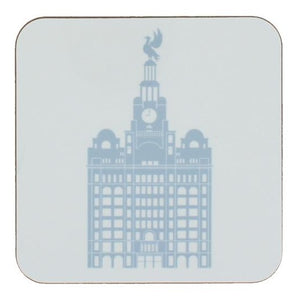 Square coaster with rounded edges showing an illustration of the liver building in light blue on a white background