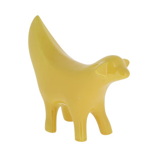 Ceramic bright yellow statue, shaped as the front half of a lamb combined with a banana.