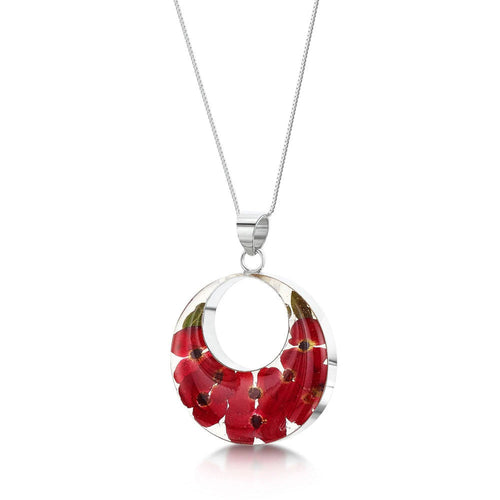 Poppy cut out round necklace