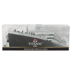 Box with a black and white photograph of the Titanic, containing an unseen replica of the ship.