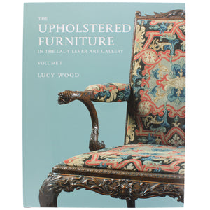 Front cover of Volume 1 of Upholstered Furniture, with a colour photograph of an ornate chair